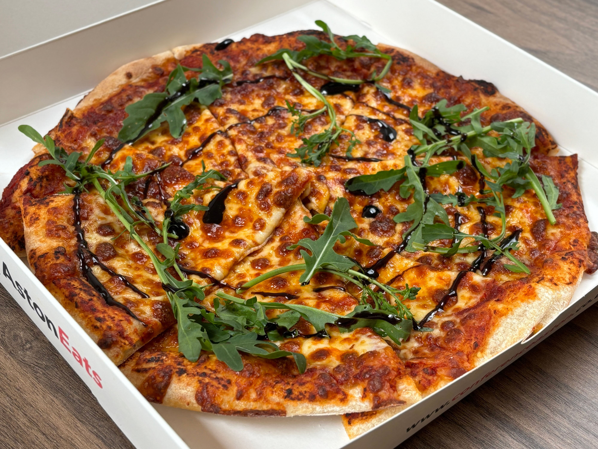 /files/aston-eats-pizza.jpg